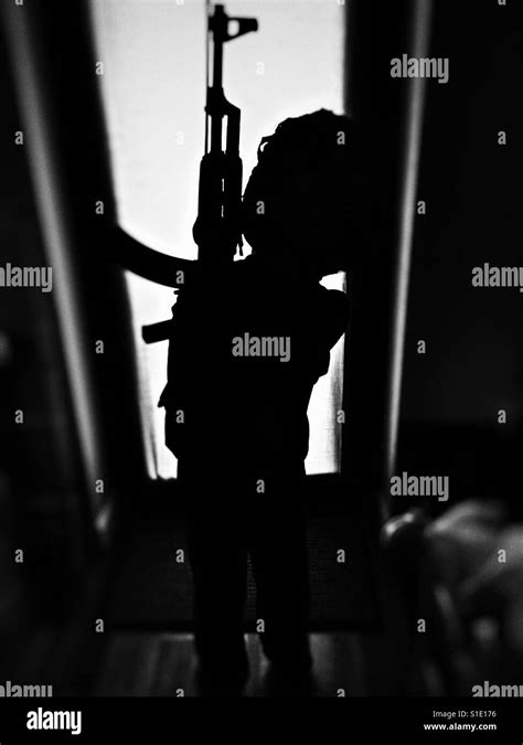 Boy Playing Soldiers Stock Photo Alamy