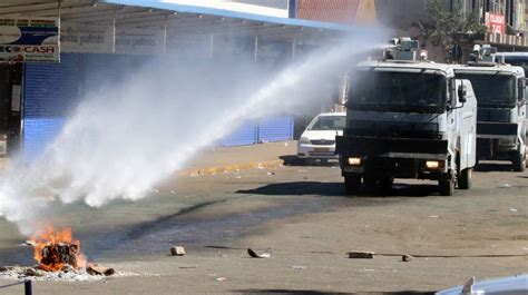 Police Fire Tear Gas At Protesters Demanding Fair Vote Robert Mugabe News Al Jazeera