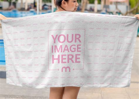 Towel Mockup Featuring A Woman Spread Her Towel At A Pool Mediamodifier