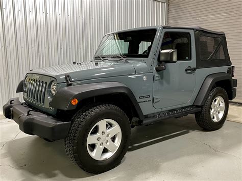 In a jeep, it's somewhat charming. 2014 Jeep Wrangler Sport | Kasser Motor Group