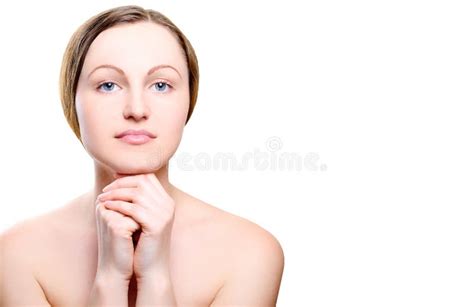 Portrait Of Girl With Nude Make Up With Hands On Chin Stock Photo