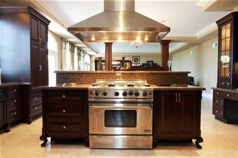 Custom kitchens by design in la plata, located in the heart of so md featuring custom kitchen designers you can trust to transform your home! Love the stove and hood. | Custom kitchen island, Kitchen ...