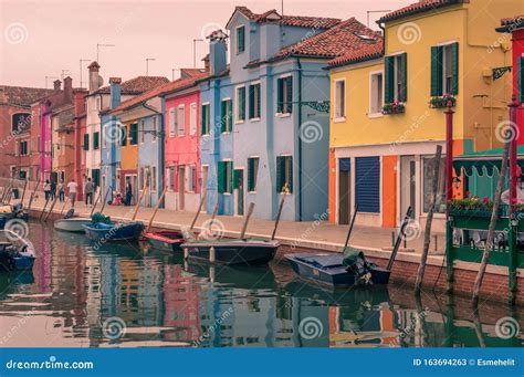 Colorful Houses Along Water Channel In Burano Island In Italy Editorial