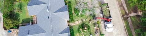Panoramic Aerial View Working Truck With A Lift Cutting Down Tree At
