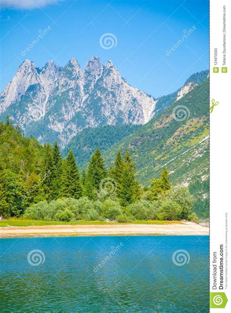 Lake Predil With Turquoise Water And Mountains In Background Near