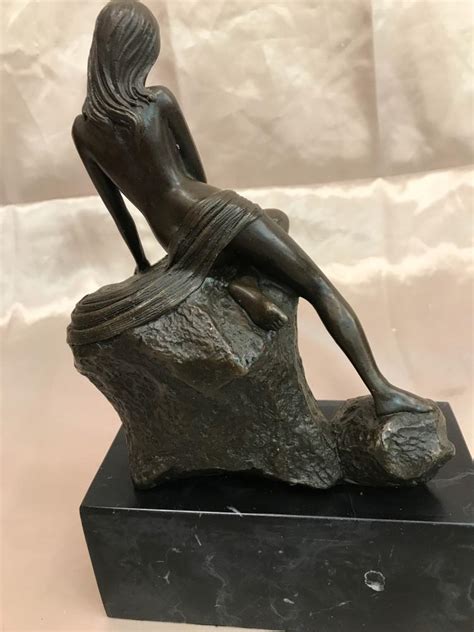 Sold Price Bronze Statue Of Woman Sitting On Rock September 6 0117