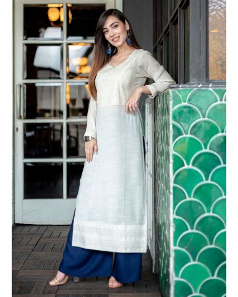 White Embroidered Kurta And Navy Blue Palazzo Set Of Two By Half Full