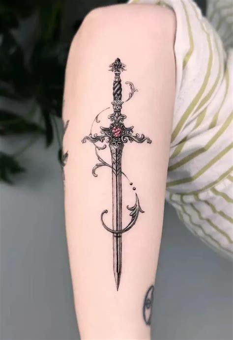 49 Elegant Sword Tattoos With Hidden Meanings