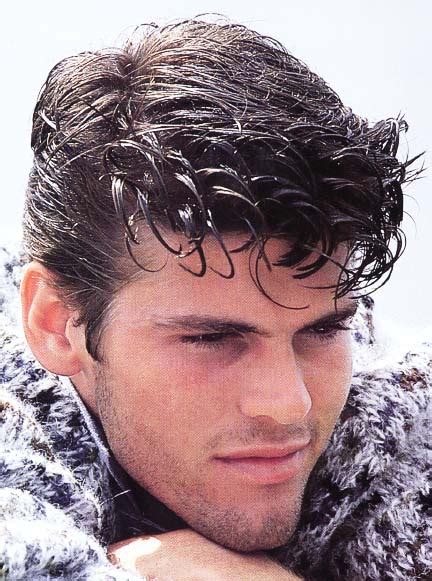 The 80s were an influential decade for men's hair. Men short wavy hairstyle with long layered bangs (2 comments)