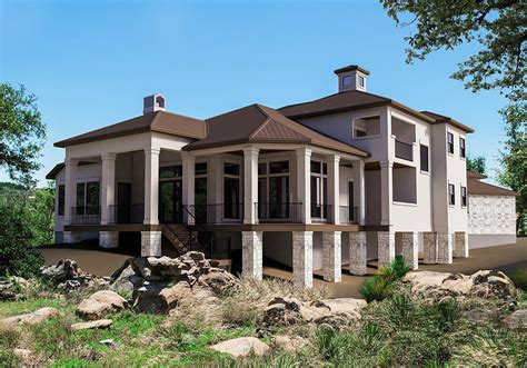 The great room, kitchen and dining offers an open design to maximize the space and allow for large family gatherings. modern four-bedroom house plan
