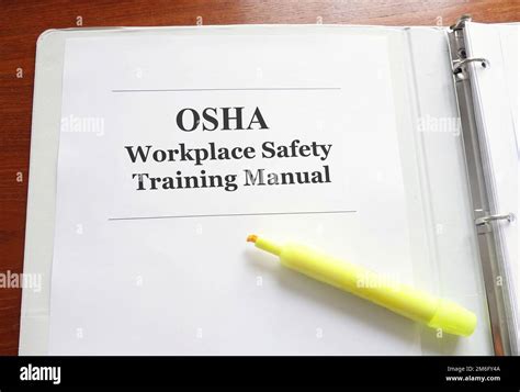 Osha Ocuupational Safety And Health Administration Manual On A Desk