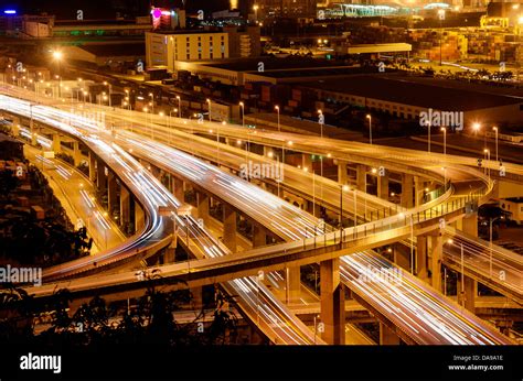 Freeway In Night With Cars Light In Modern City Stock Photo Alamy