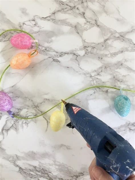 Diy Easter Egg Garland An Easy Dollar Tree Craft In 2020 Easter
