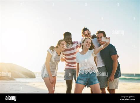 First Selfie Of Summer A Happy Group Of Friends Taking Selfies Together At The Beach Stock