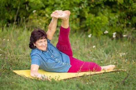 Beautiful Mature Woman Doing Yoga In Nature Stock Image Image Of