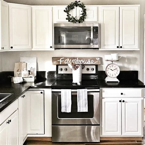 Wherever you live, you can recreate the old charisma of your cooking. Farmhouse kitchen white cabinets and black granite. Modern ...