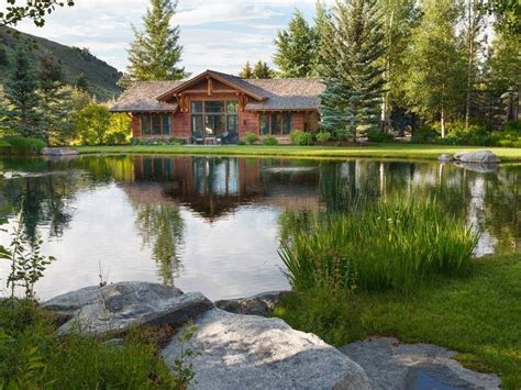 Gorgeous Setting For A Log Home Complete With Its Own Man