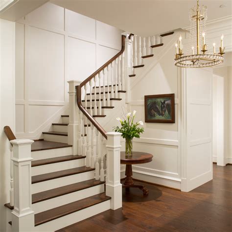Elegant Foyer Stair Wraps A Paneled Two Story Entry Hall Classique