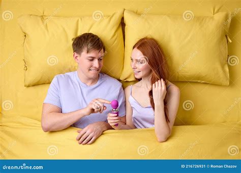 Beautiful Caucasian Couple Using During Sex New Sex Toy In Hands Stock Image Image Of Relax