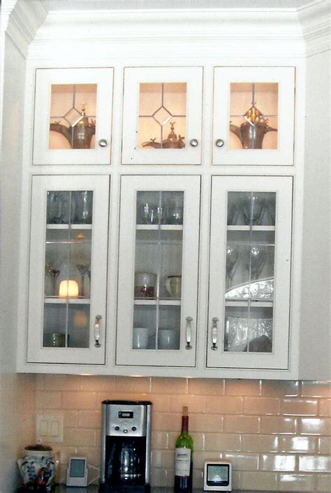 The look comes together with gold hardware fixtures. 169 best images about Glass Cabinet Doors on Pinterest ...