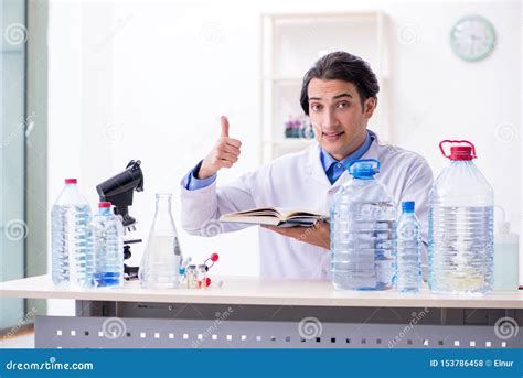 Young Male Chemist Experimenting In Lab Stock Photo Image Of Doctor