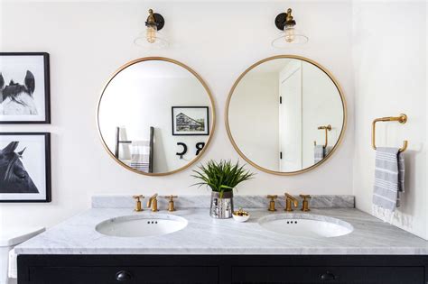 A common approach is to make the mirror exactly as wide as the vanity so the two line up. round mirror above 72 inch double vanity - Google Search ...