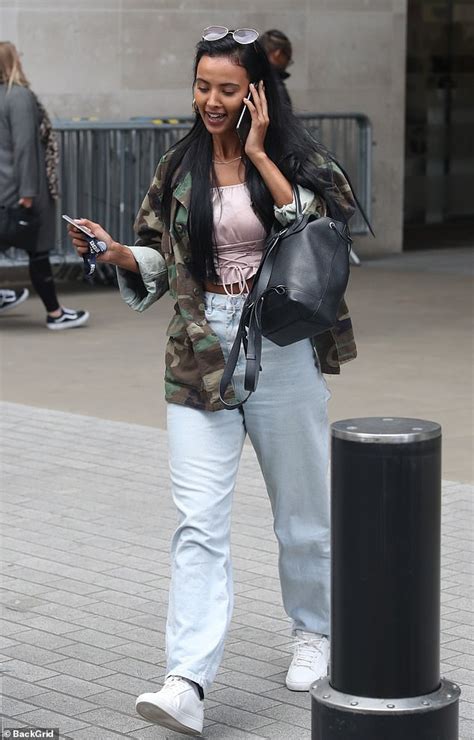 Maya Jama Looks Casually Cool In A Pink Crop Top As She Embarks On A