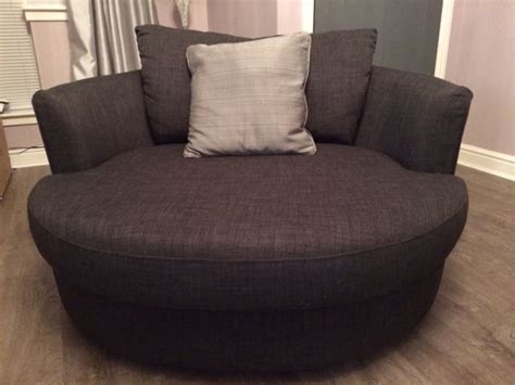 Ashley furniture designed and manufactured this smoke gray color swivel this lounge couch features capability to swivel 360 degrees thanks to a swivel track on the base. Best 10+ of Round Swivel Sofa Chairs