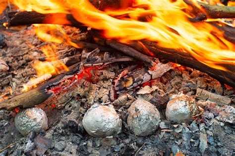 After 45 minutes you will have a perfect baked potato. Campfire Recipes - Foil Wrapped Baked Potato | 4WAAM