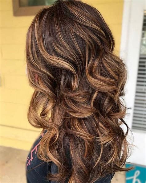 On a long curly hairstyle, the light will catch the colors in all the best ways. 70 Brilliant Brown Hair With Blonde Highlights Ideas