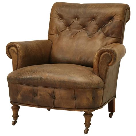 Restored vintage hand made in chelsea bordeaux leather armchair part of suite. Antique Leather Armchair, circa 1900s | From a unique ...