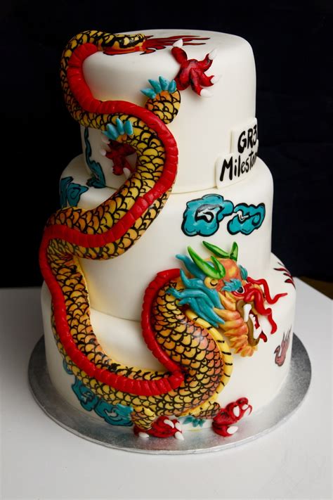 Birthday cakes are often layer cakes with frosting served with small lit candles on top representing the celebrant's age. Chinese Dragon Cake - CakeCentral.com