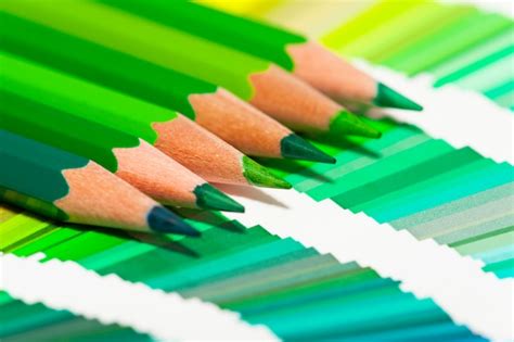 Premium Photo Green Colored Pencils And Color Chart Of All Colors