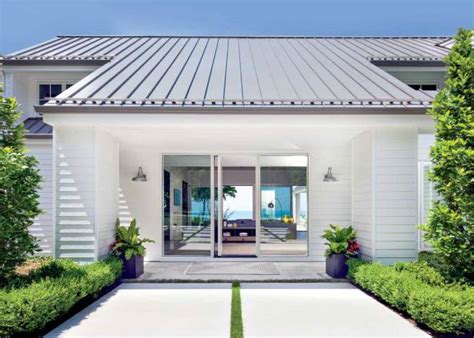 Whites if you really feel you must use white for your primary exterior color, match the shade as closely as possible to your roof. Front Home Exterior With White Siding and Metal Roof | HGTV