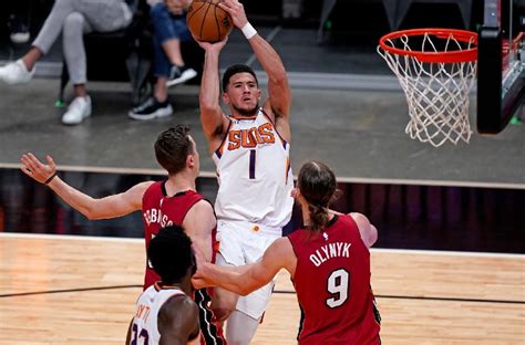 Nba Devin Booker Leads Suns Past Heat For 3rd Straight Win Abs Cbn News