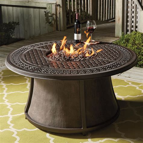 Signature Design By Ashley Burnella Outdoor Round Fire Pit Table