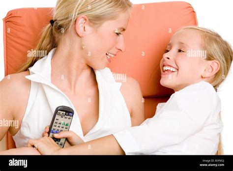 Mother And Daughter Cuddle Stock Photo Alamy
