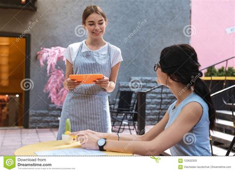 Beautiful Waitress Feeling Worried While Having Her First Day At Work