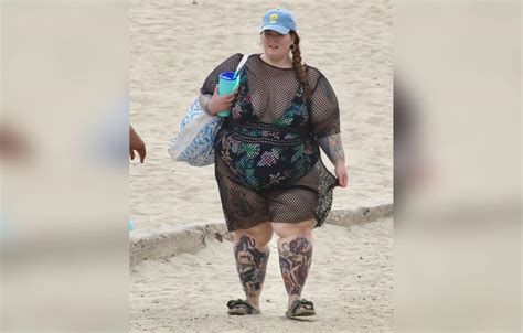 Plus Size Model Tess Holliday Hits Beach In Swimsuit