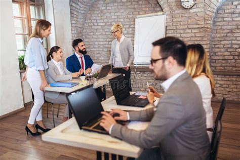 Young Business People Working Together In Creative Office Stock Image