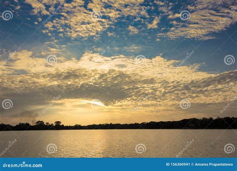 Beautiful Silhouette Sunset And Clouds At The Lake Stock Image Image