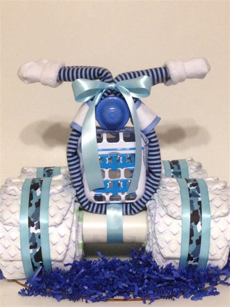 When it comes to decorating for the event there are so many fun. Luv My Blue Camo Baby 4 Wheeler Diaper Cake - http://www.babyshower-decorations.com/luv-my-blu ...