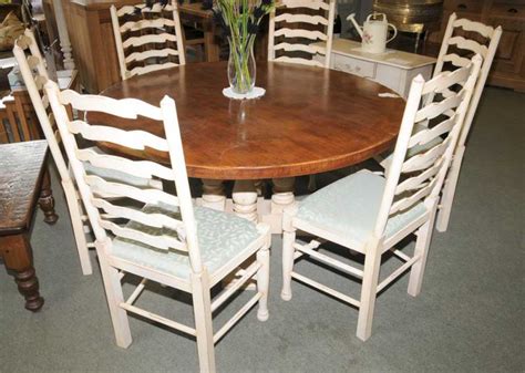This wooden dining table is built with a single pedestal base. Round Farmhouse Painted Kitchen Dining Table Oak