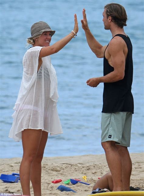 Bethany Hamilton Beams As She S Lifted Into The Air By New Husband Adam Dirks While Pair Frolic