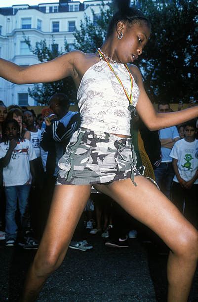 A Young Black Girl Dancing Wearing A Short Camouflage Skirt Notting