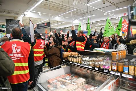 Employees Of The Carrefour France Group Assisted By A Belgian News