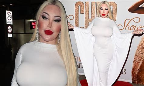Jessica Alves Shows Off Her Voluptuous Curves In A White Winged Dress
