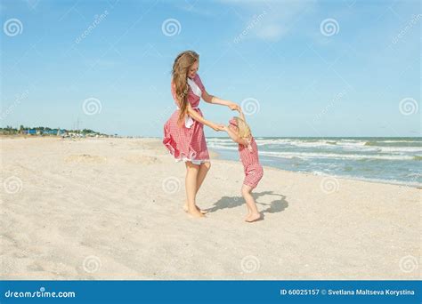 Mother And Her Daughter Having Fun On The Beach Stock Image Image Of Delight Caucasian 60025157