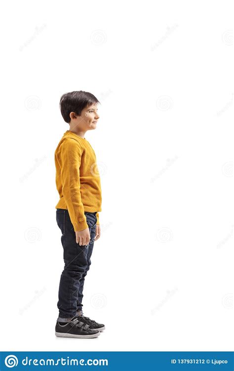 Boy standing and waiting stock photo. Image of male - 137931212
