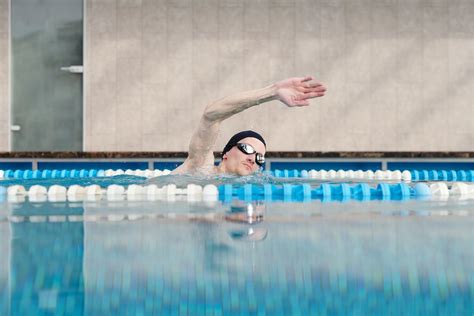 Person In Swimming Goggles In Swimming Pool · Free Stock Photo